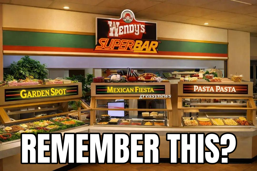 The image shows the interior of a Wendy's Super Bar buffet with labeled stations for Garden Spot, Mexican Fiesta, and Pasta Pasta under the main sign. The large caption text "REMEMBER THIS?" overlays the bottom of the photo, evoking nostalgia for this discontinued all-you-can-eat menu option. The meme relies on shared cultural memory to trigger recognition and fond recollection among those who experienced it.